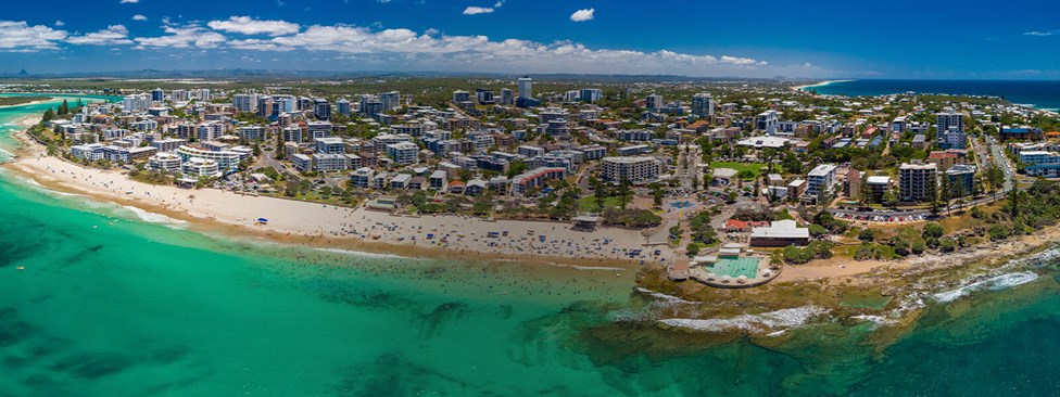 Aerial view of Caloundra Beach with city in background